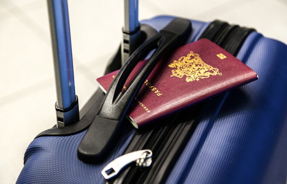 A picture of a passport on a bag.