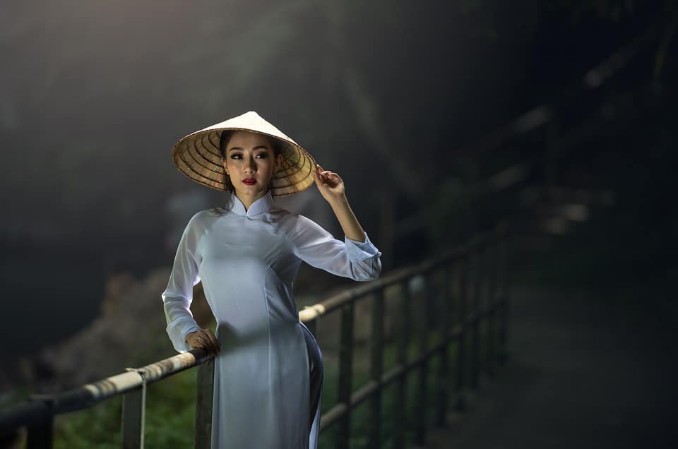 Woman in traditional Vietnamese dress.
